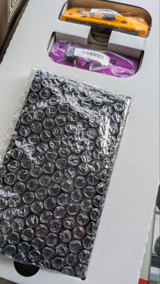 Nintendo Switch 紫とオレンジのジョイコン