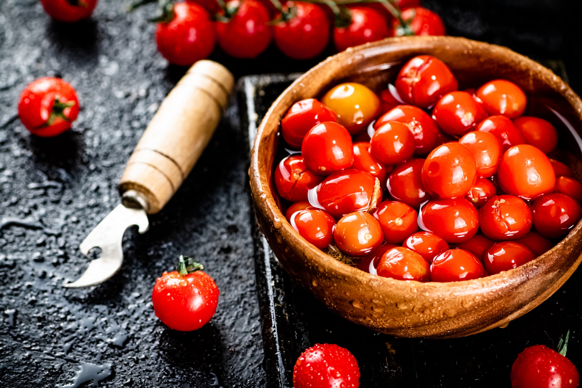 Pickling ripe homemade tomatoes on the table.